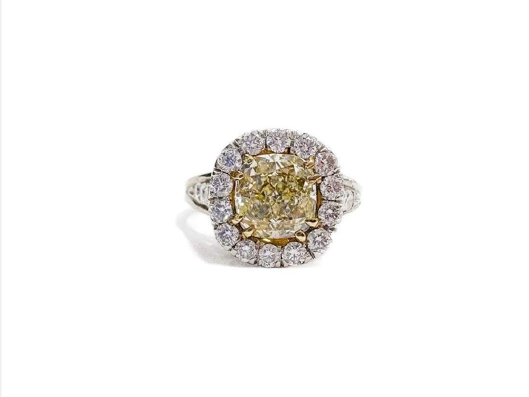 18kt Gold & Platinum Fancy Light Yellow Diamond Halo Engagement Ring