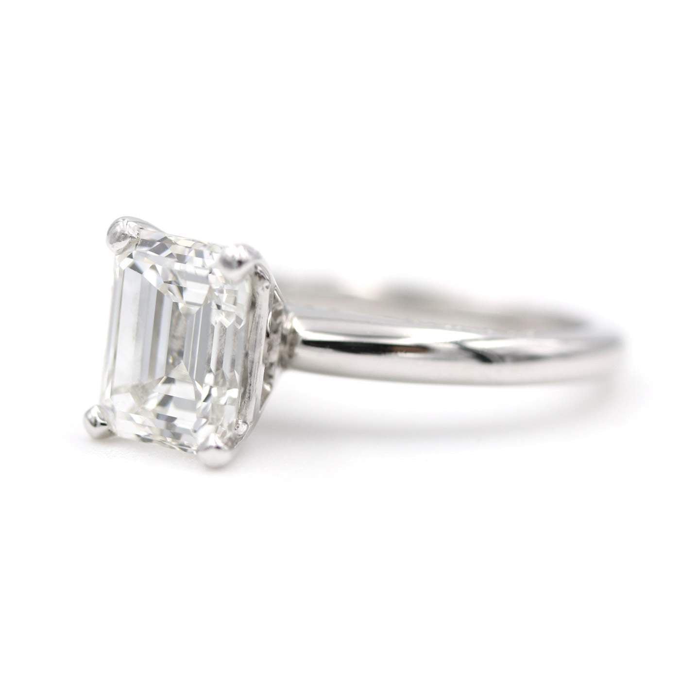 Platinum 3.01ct Emerald Cut Diamond (G/VS1 GIA Grading Report )Ring With .20ctw Round Diamonds Prong Set on Profile. Provident Jewelery