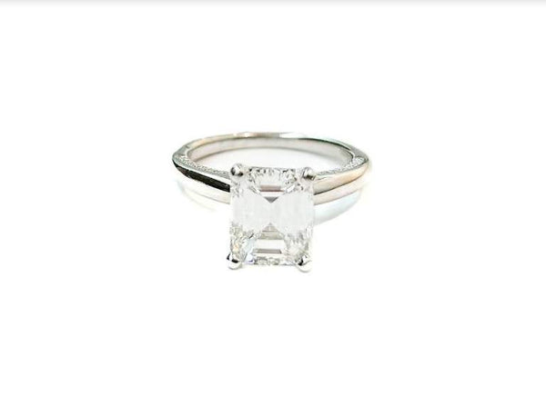 Platinum 3.01ct Emerald Cut Diamond (G/VS1 GIA Grading Report )Ring With .20ctw Round Diamonds Prong Set on Profile. Provident Jewelery