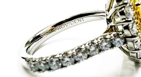 18kt Gold Fancy Yellow Diamond Double Halo Ring