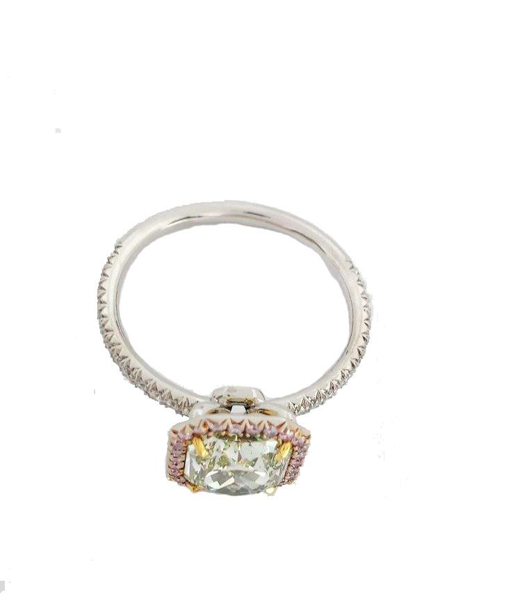 Platinum & 18kt Yellow Gold Fancy Yellow Green Radiant Cut Diamond Halo Ring