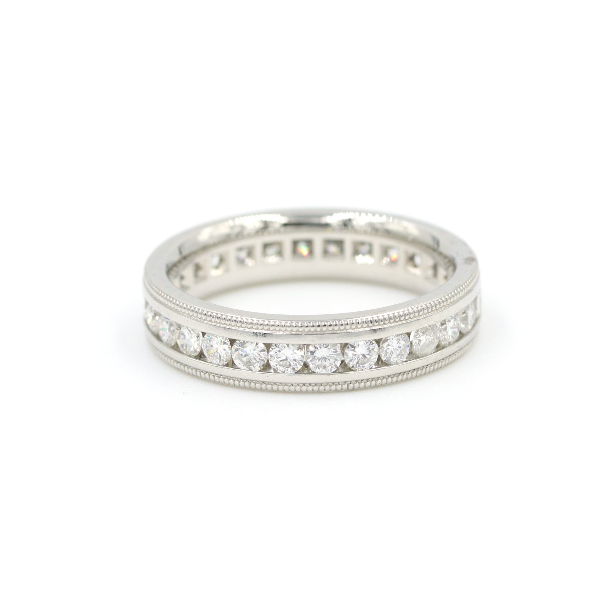 Platinum Coin Edge Channel Set Diamond Eternity Band