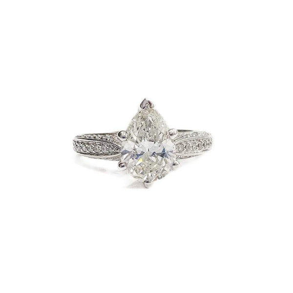 18K White Gold 1.25Ct (H/VS1) Pear Shape Diamond, GIA Inscribed On Girdle, 5 Prong Set. Pave Top And Sides Of Mounting 50D=~.52ctw