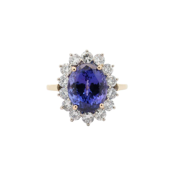 14K Yellow Gold  6.34Ctw Faceted Oval Tanzanite (11.97x9.72x7.55mm) And Round  ~1.70Ctw Diamond Halo Ring. Provident Jewelery