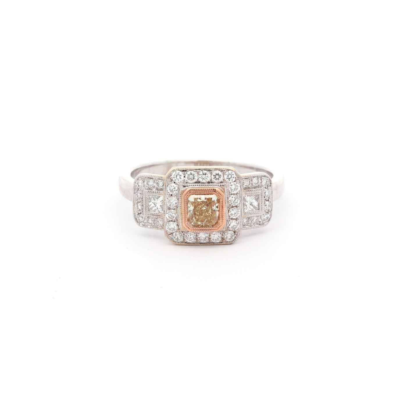 18kt White Gold Fancy Yellow Diamond Three-Stone Halo Ring