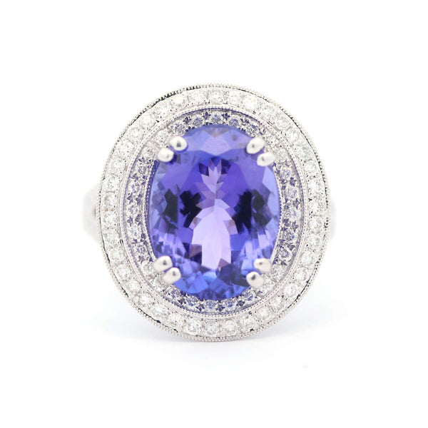 18K White Gold ~6.05Ctw Oval Tanzanite And ~0.79Ctw Diamond Double Halo Ring