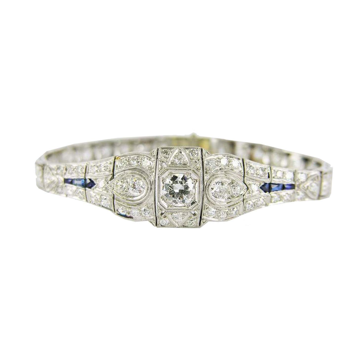 Platinum And 18K White Gold Deco Bracelet Containing 67 Round Diamonds Weighing ~6.00Ctw With Sapphire Accents