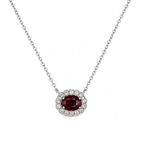 14K Diamond Halo Surrounding Oval Ruby