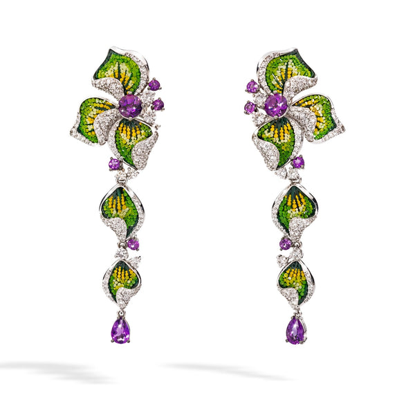 Pair of floral earrings with green, purple, and yellow accents on a white background