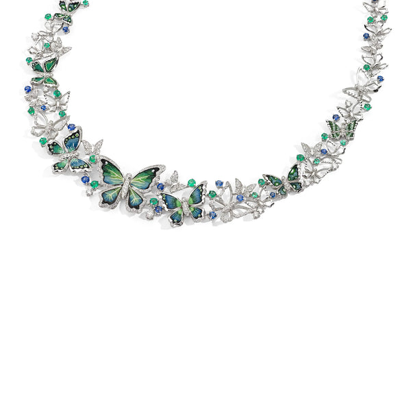 Butterfly-themed necklace with green and blue accents on a white background