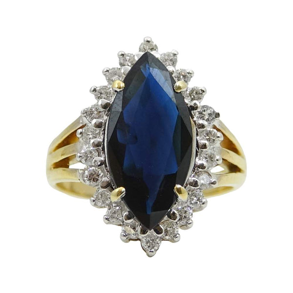 4.10 CTW SAPPHIRE AND DIAMOND RING