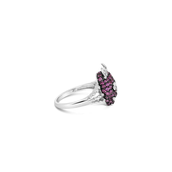 18KT WHITE GOLD PINK SAPPHIRE AND DIAMOND DEVIL RING. Provident Jewelery