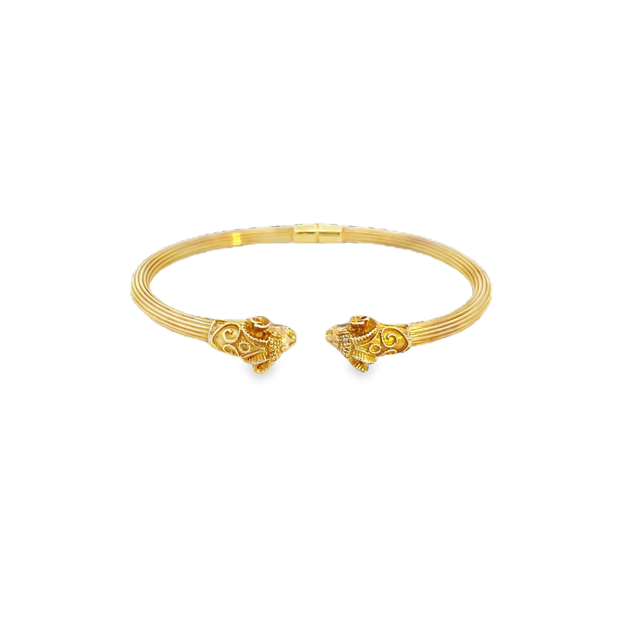 14KT VINTAGE RAMS HEAD BANGLE.