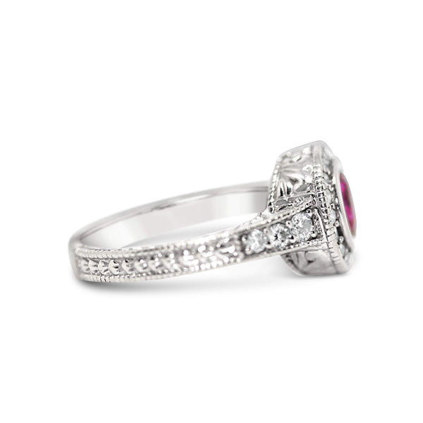 14KT WHITE GOLD PINK SAPPHIRE AND DIAMOND RING