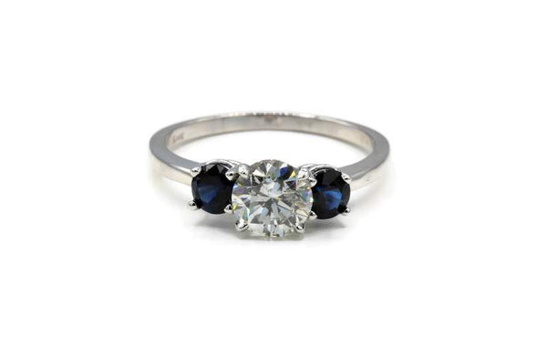 ROUND DIAMOND AND SAPPHIRE ENGAGEMENT RING