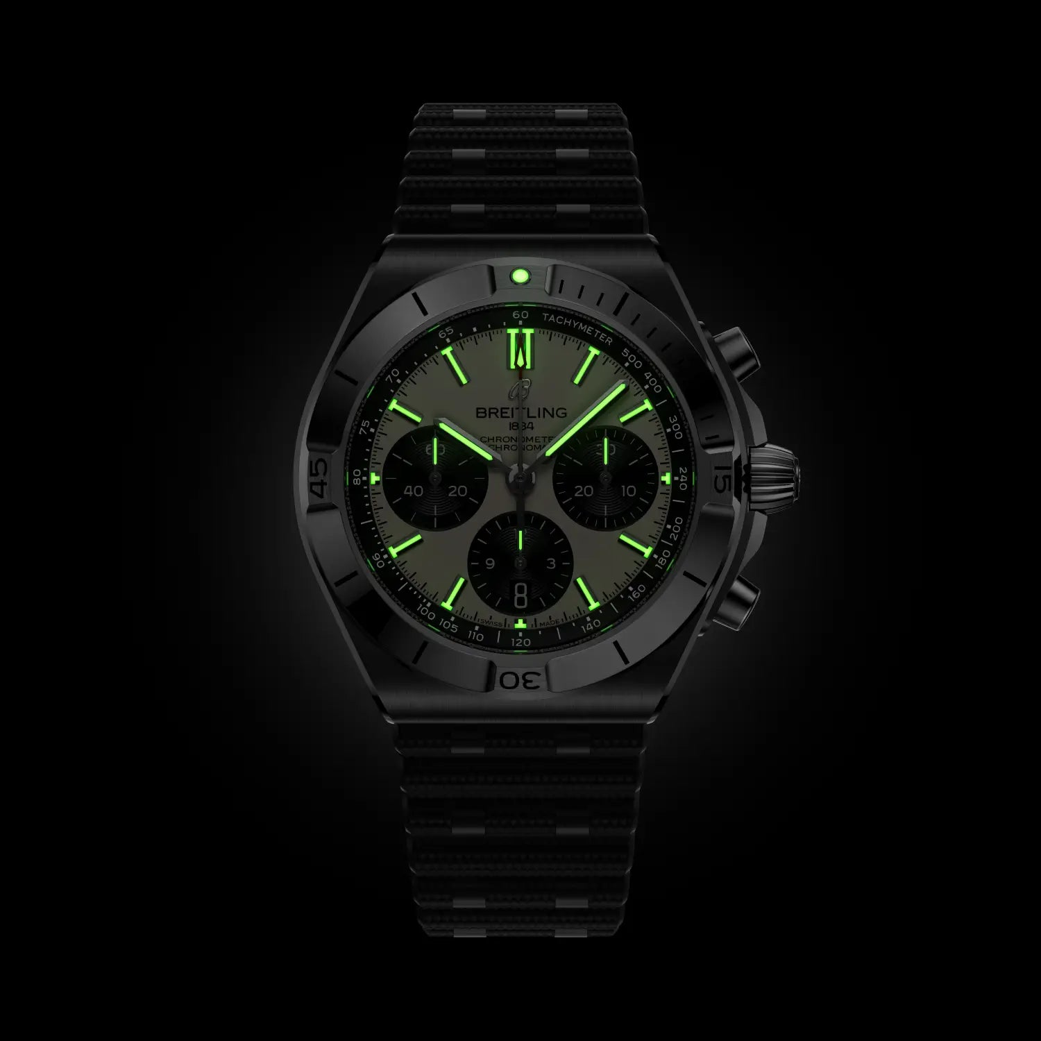Black watch with green digital display on a black background