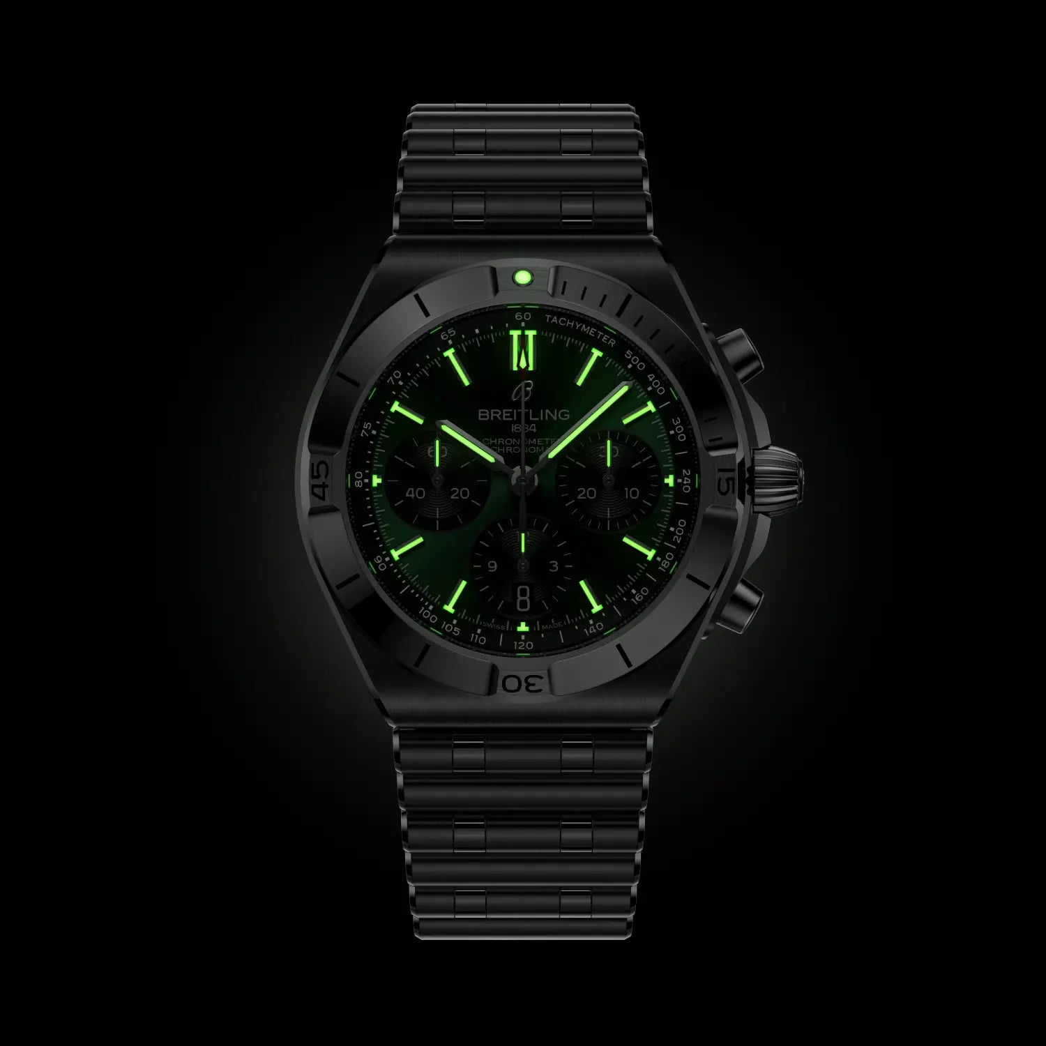 Black watch with green glowing face on a black background
