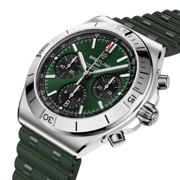 Breitling watch with green strap and green dial on a white background