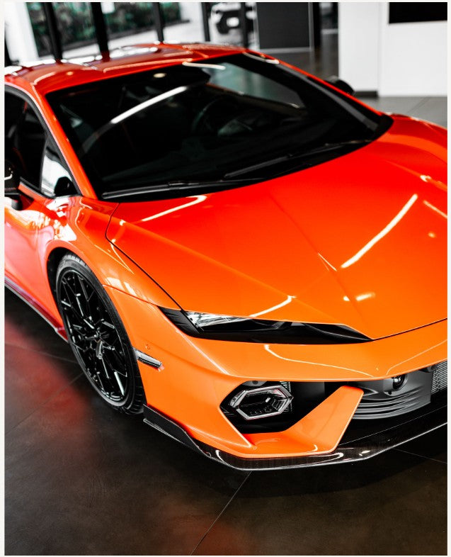 Side view of orange Lamborghini car