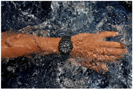 Lifestyle Image- Male arm in water wearing Bell & Ross BR-03 Diver Black Matte Ceramic watch