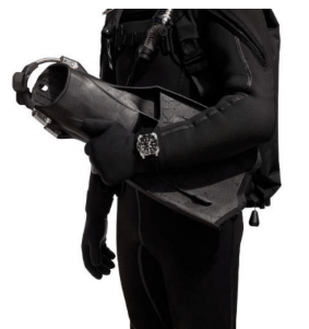 Lifestyle Image- Male diver wearing scuba gear, carrying fins and wearing dive watch