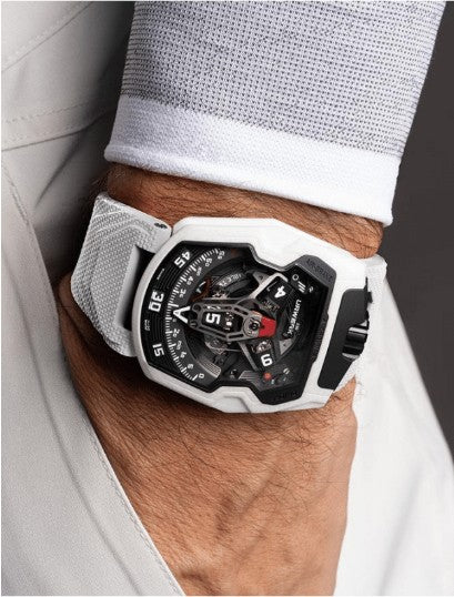 Lifestyle Image- URWERK- UR-230 Polaris Watch on man's wrist wearing white shirt with hand in pocket