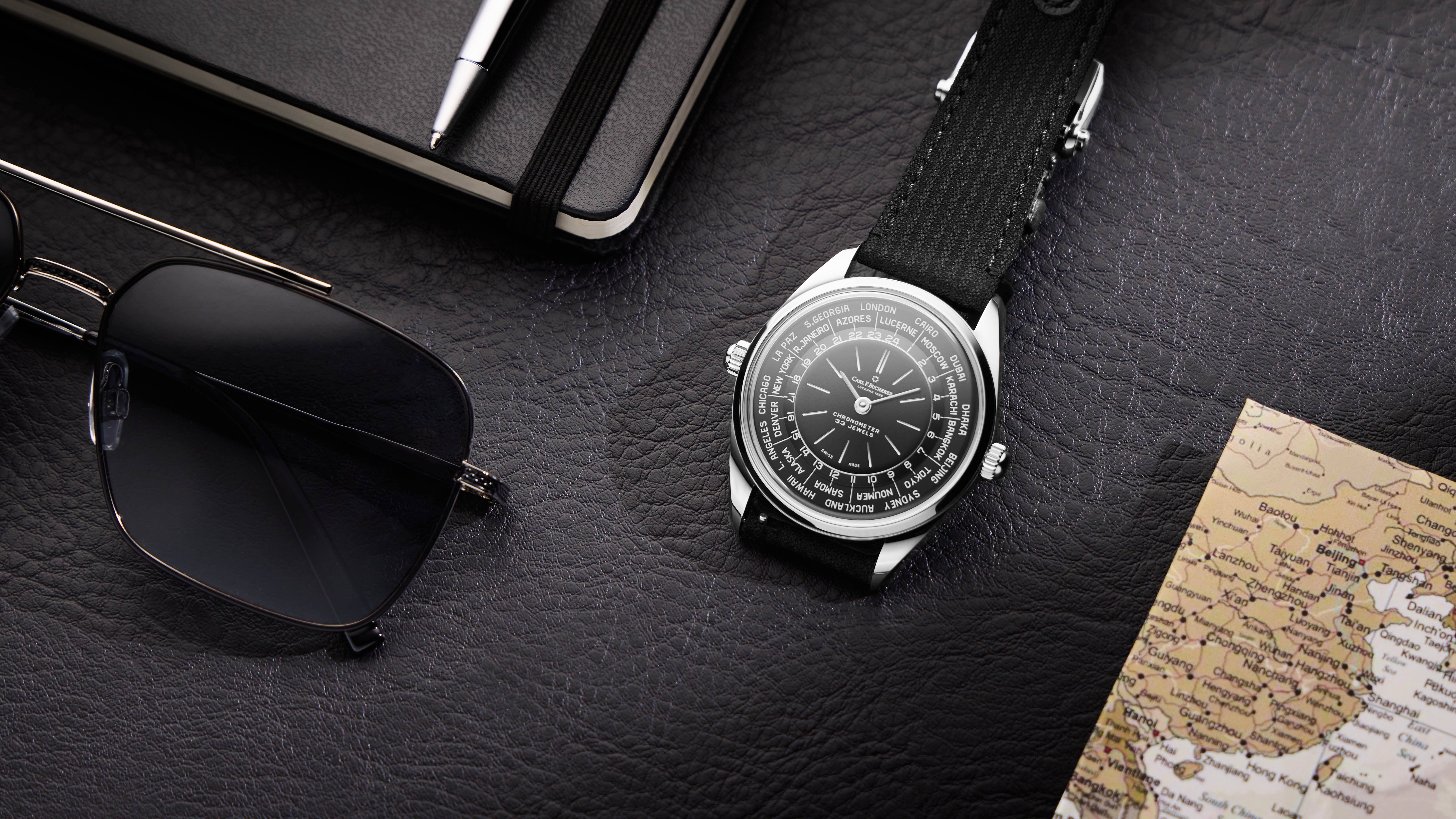 Front View- Carl F. Bucherer Heritage Worldtimer Watch in white gold with back strap