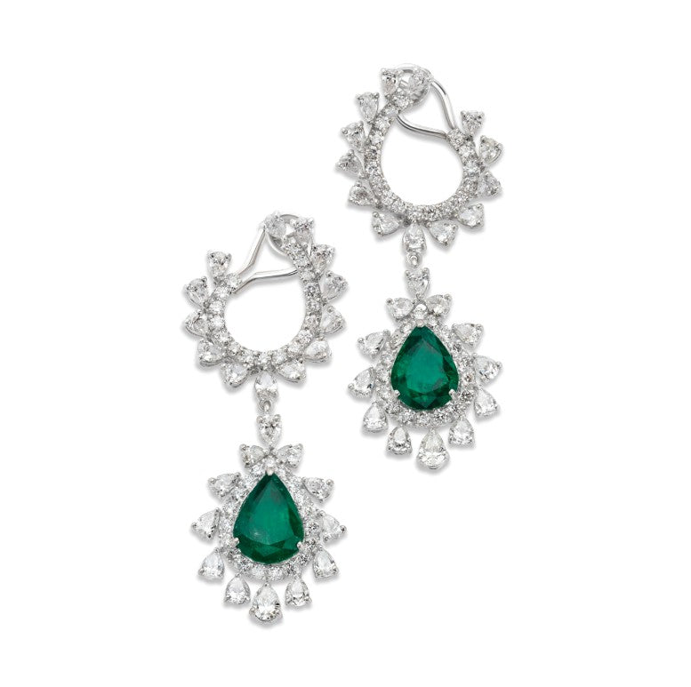 Product Image- Diamond dangle earrings with emerald stone in the middle.