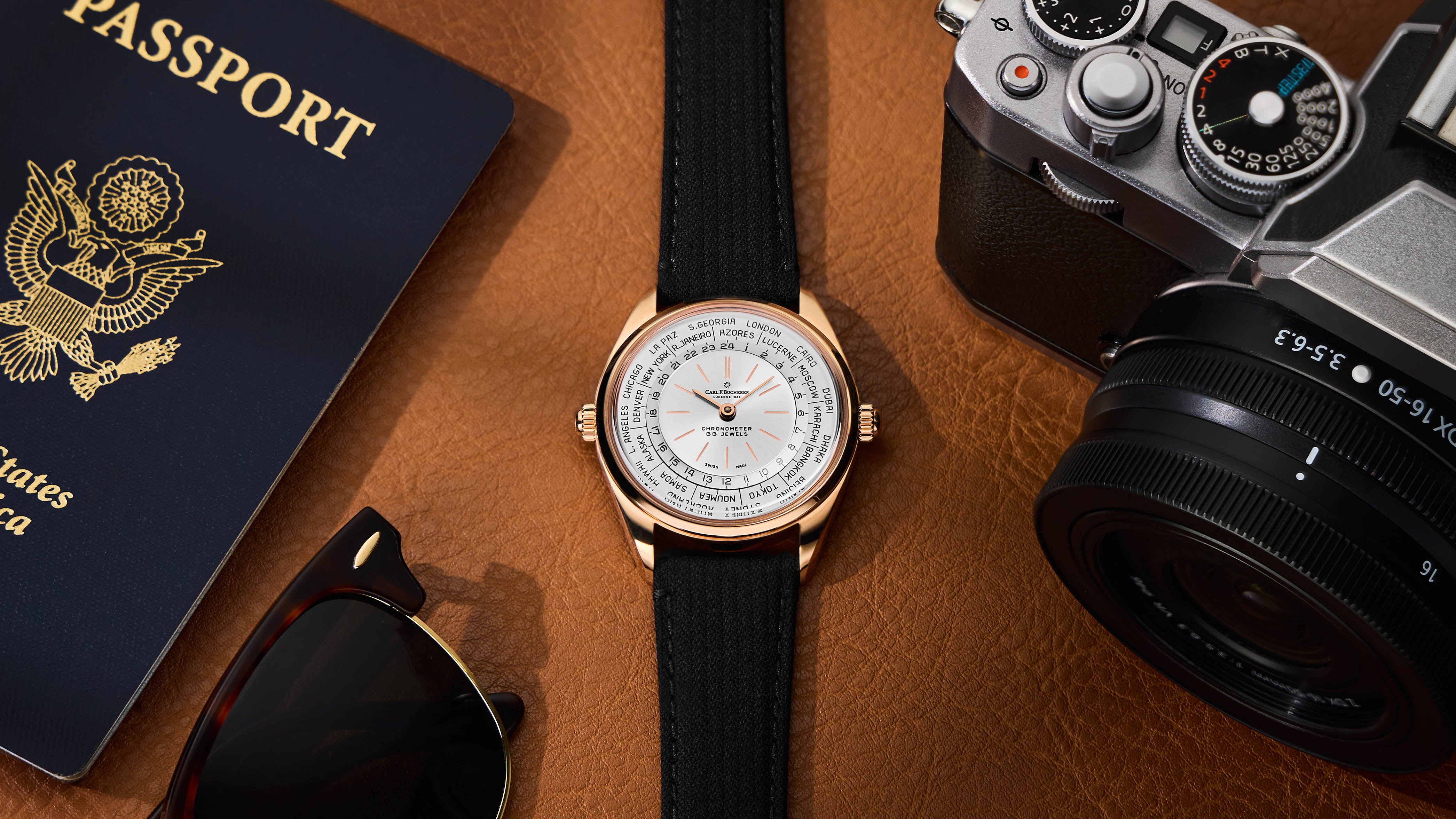 Front View- Carl F. Bucherer Heritage Worldtimer Watch in yellow gold with back strap